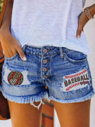 Button-breasted printed patch denim shorts with ripped fringed hot pants - Stormyjay